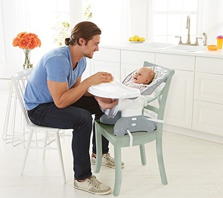Fisher-Price SpaceSaver high chair being used.